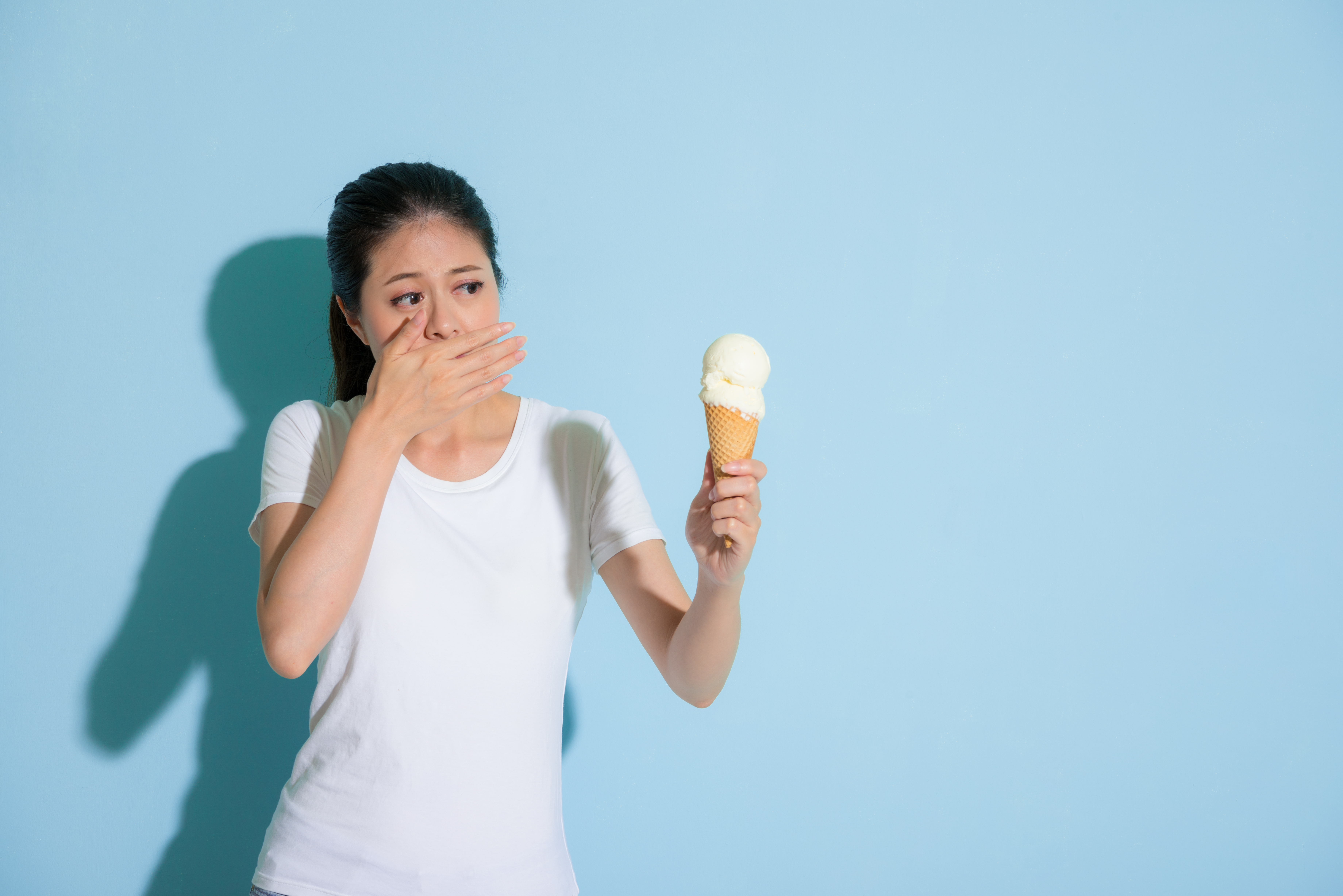 bigstock Sweet Girl Eating Ice Cream An 200845186 1