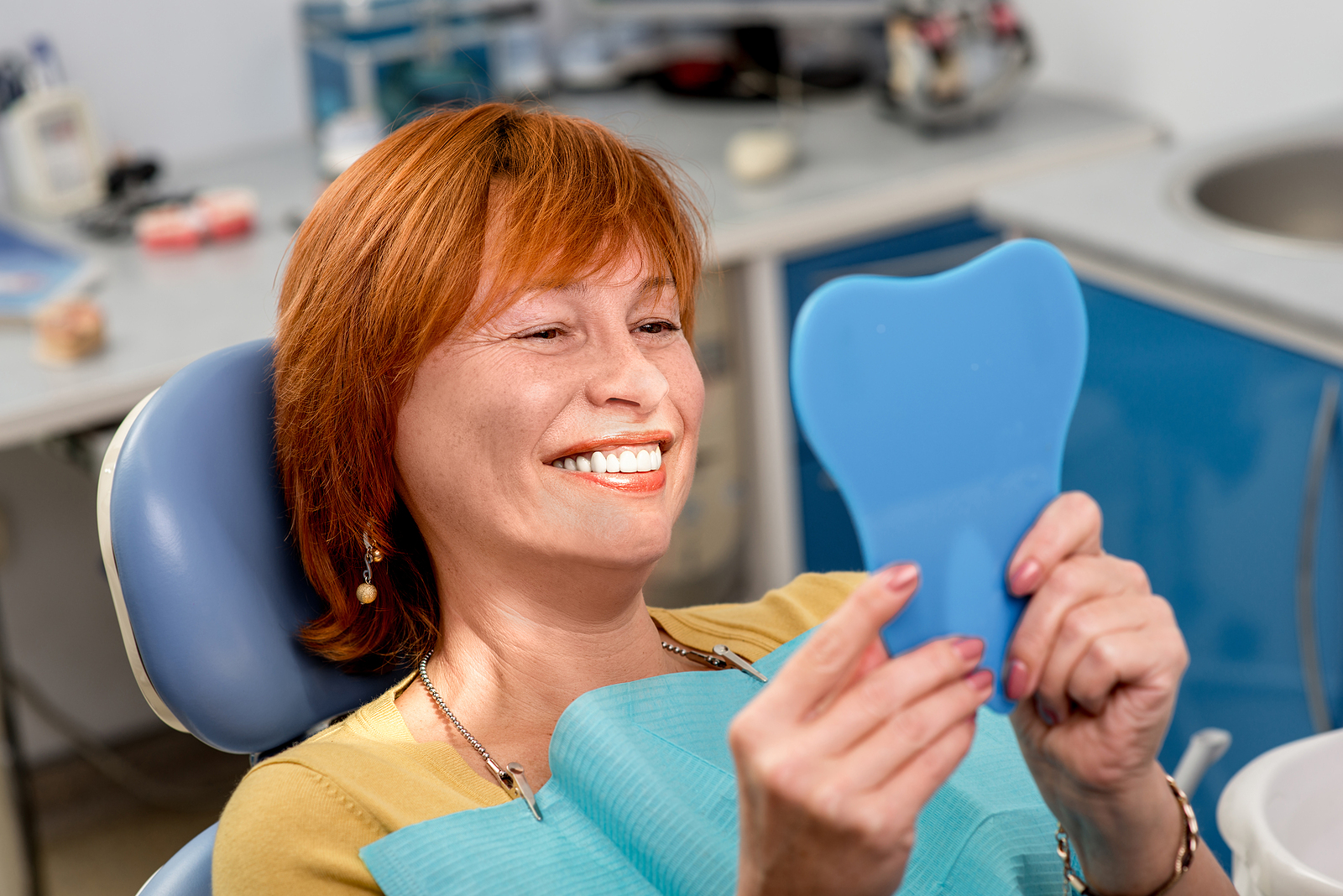 bigstock Senior woman in the dental off 77401721