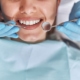 bigstock Cheerful Positive Dentist And 417206509
