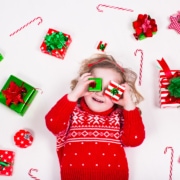 Little Girl Opening Christmas Presents